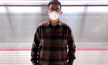 China Sneezes and the World Catches Pneumonia, man wearing face mask