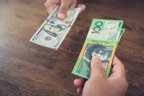 Exchanging,Money,Between,Us,Dollar,(usd),And,Australian,Dollar,(aud)