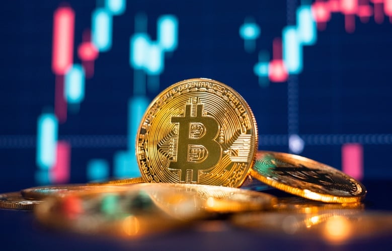 Bitcoin,Gold,Coin,And,Defocused,Chart,Background.,Virtual,Cryptocurrency,Concept.